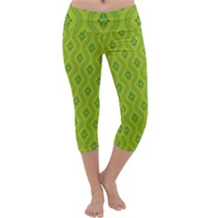 Decorative Green Pattern Background  Capri Yoga Leggings by TastefulDesigns