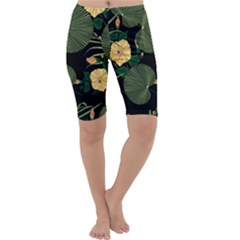 Tropical Vintage Yellow Hibiscus Floral Green Leaves Seamless Pattern Black Background  Cropped Leggings  by Sobalvarro