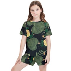 Tropical Vintage Yellow Hibiscus Floral Green Leaves Seamless Pattern Black Background  Kids  Tee And Sports Shorts Set by Sobalvarro