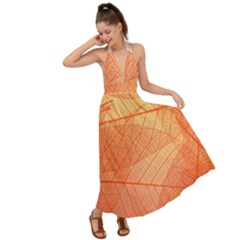 Abstract Texture Of Colorful Bright Pattern Of Transparent Leaves Of Orange And Yellow Color Backless Maxi Beach Dress by Posterlux